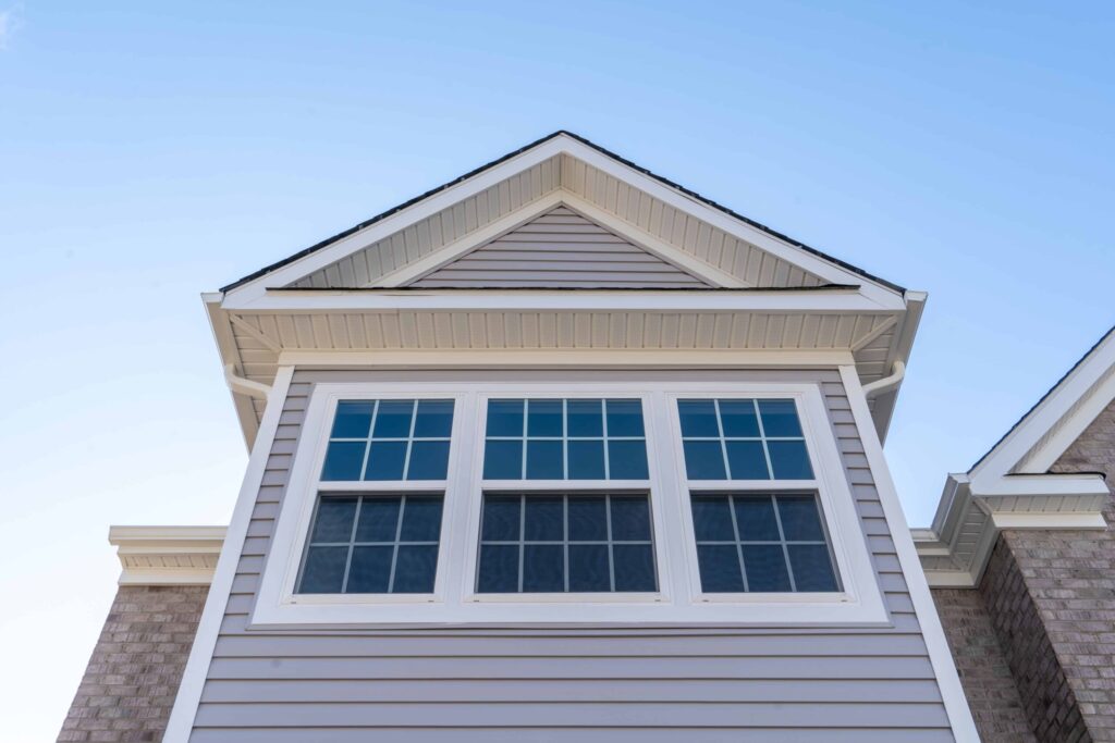 Exterior home view featuring professionally installed energy-efficient windows by Wallaby Windows, enhancing curb appeal and long-term durability