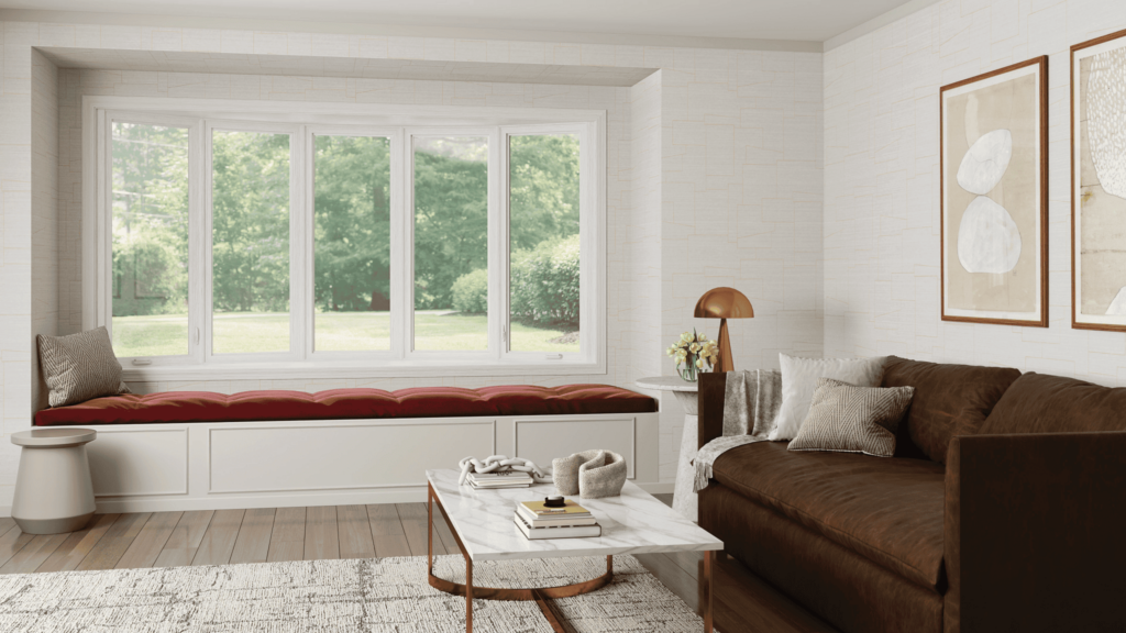 Cozy living room with built-in window bench and energy-efficient replacement windows by Wallaby Windows, providing clear outdoor views and improved insulation