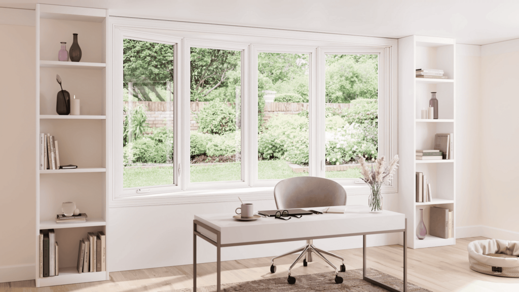 Multi-panel casement window installation in home office with wide outdoor view