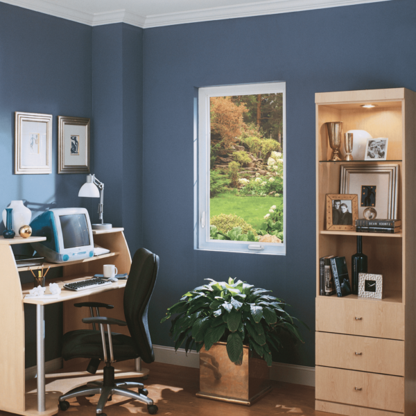 Wallaby Windows single-hung window in modern home office providing natural light and backyard garden views