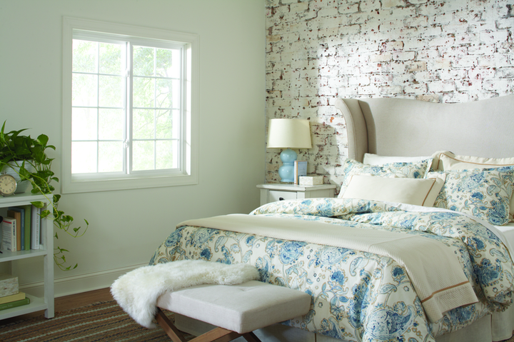 Modern slider replacement window installed in Durham NC bedroom by Wallaby Windows